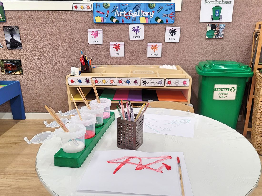 A toddler taking part in an art activity at Donvale ELC